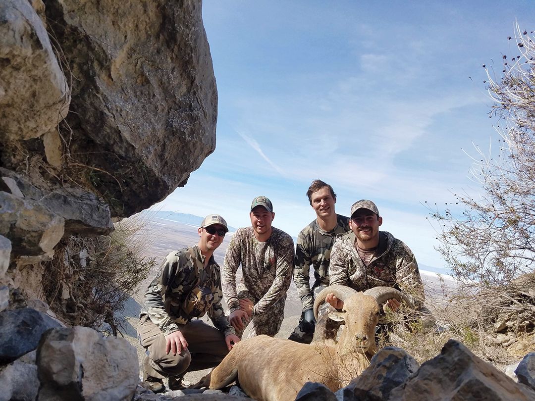 Austin Borders (right) shot his first-ever big-game animal on a New Mexico aoudad hunt.